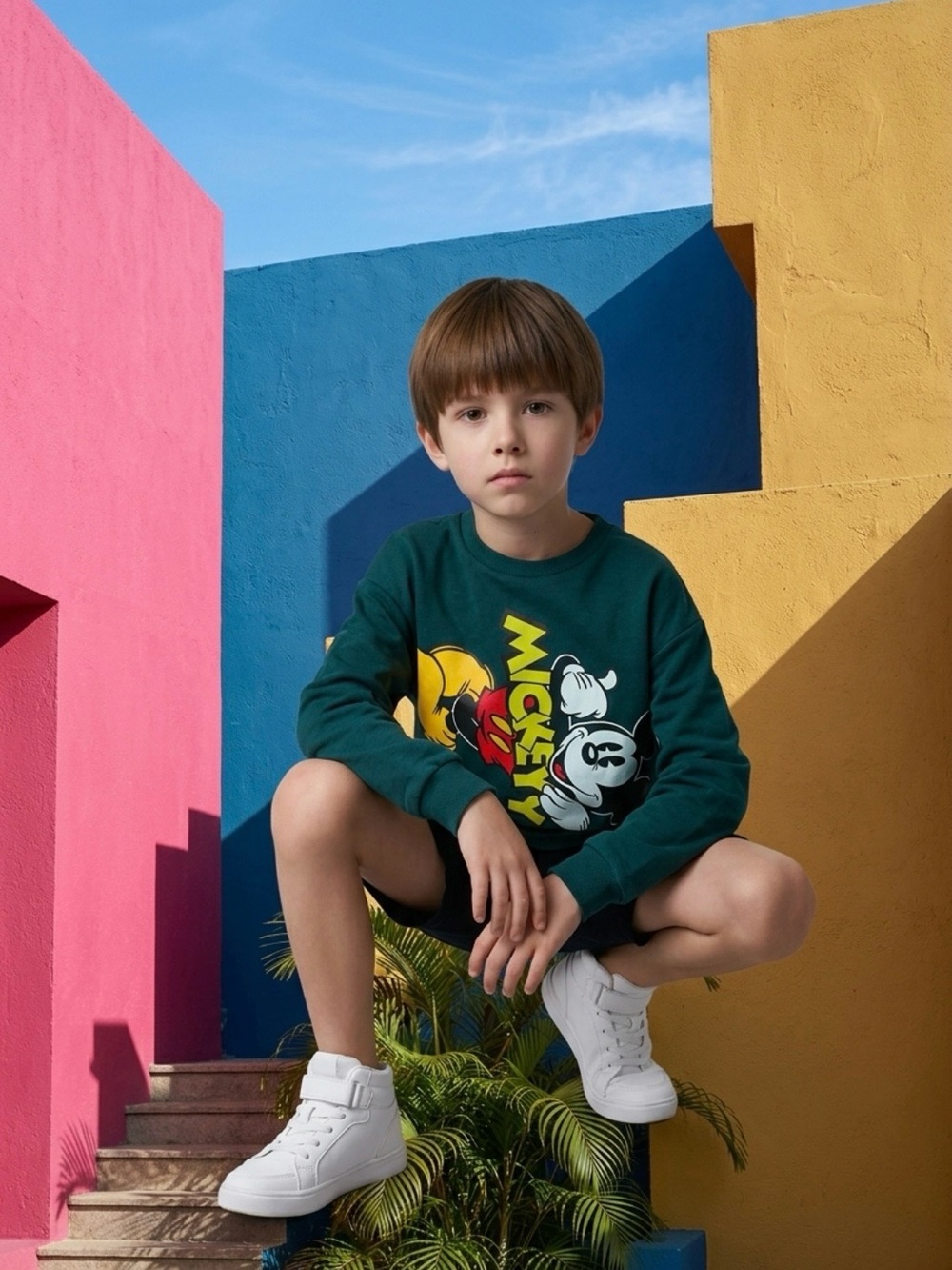 Disney Teal Mickey Mouse Graphic Sweatshirt with Yellow and Red Accents
